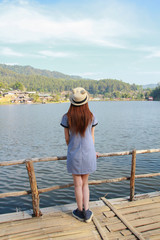 An Asiangirl traveling alone in the lake.