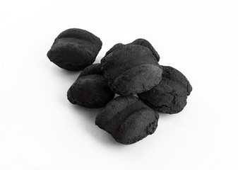 Obraz na płótnie Canvas group of bbq charcoal briquette on white background