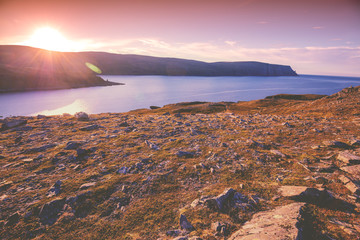 Barents sea. Beautiful seashore at sunset. Wild nature of Norway. Nordkapp, Mageroya island