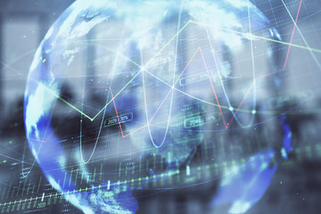 Stock and bond market graph and world map with trading desk bank office interior on background. Multi exposure. Concept of international finance