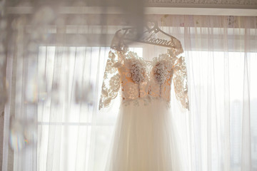 wedding dress in the interior of the bedroom