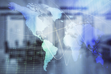 World map with trading desk bank office interior on background. Multi exposure. Concept of international finance