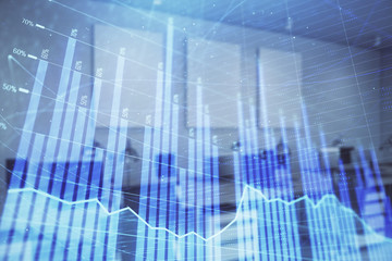 Stock market chart with trading desk bank office interior on background. Double exposure. Concept of financial analysis