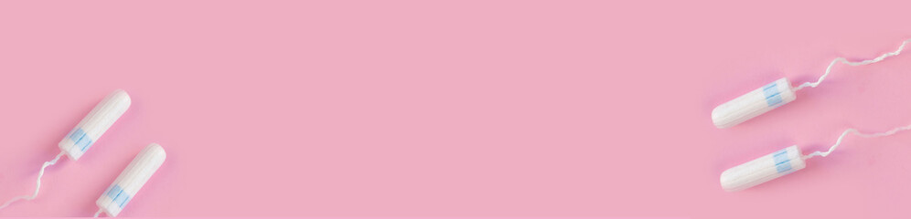 tampons on a pink background. 