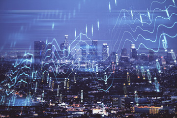 Financial graph on night city scape with tall buildings background double exposure. Analysis concept.