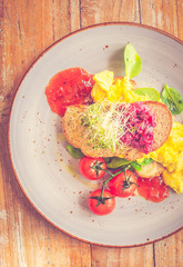 Scrambled Egg On Toast Toasted rye bread, beetroot and cottage cheese, baby spinach, cherry vine tomato, alfa alfa sprout, chilli jam