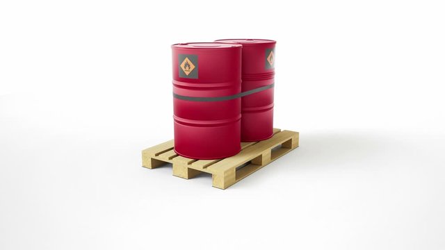Two metal red barrels with flammable symbol, located on wooden pallet, isolated on white background. Barrels are strapped by tape. Camera truck movement. 60 fps animation.