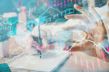 Forex chart displayed on woman's hand taking notes background. Concept of research. Multi exposure