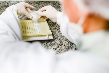  manipulation of  white capsules in the pharmacy