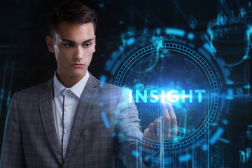 The concept of business, technology, the Internet and the network. A young entrepreneur working on a virtual screen of the future and sees the inscription: Insight