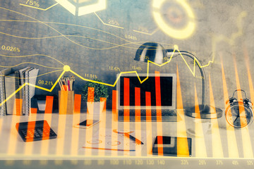 Multi exposure of chart and financial info and work space with computer background. Concept of...