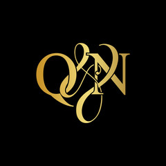 Initial letter Q & N QN luxury art vector mark logo, gold color on black background.