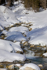 Alpine river in winter