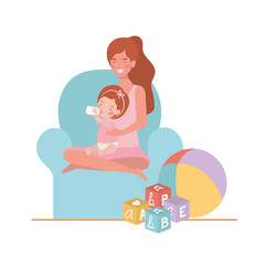 cute pregnancy mother with little girl seated in sofa