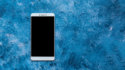 smartphone on abstract blue background
