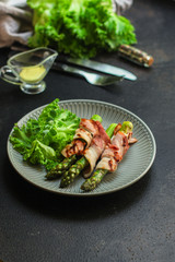 asparagus in bacon - tasty and healthy food, menu concept. food background. copy space