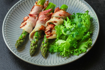 asparagus in bacon - tasty and healthy food, menu concept. food background. copy space