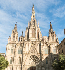 Fototapeta na wymiar Medieval towers of the Metropolitan Cathedral Basilica of Barcelona (also known as The Cathedral of the Holy Cross and Saint Eulalia) located in the gothic quarter in Catalonia, Spain, Europe.