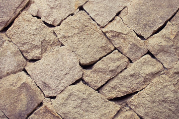 Diagonal masonry, rock.