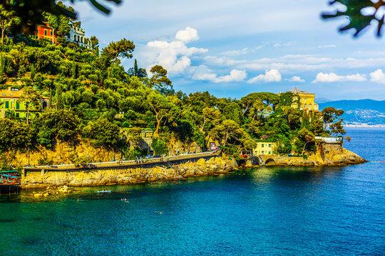 Beach next to Portofino in Italy. Beautiful bay of Paraggi. Swimming vacation in Italy