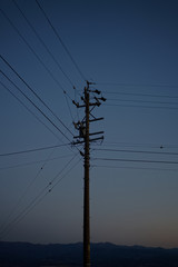 Japanese telegraph pole and mountain landscape