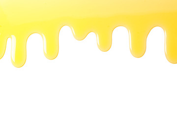 Flow of sweet honey isolated on white background