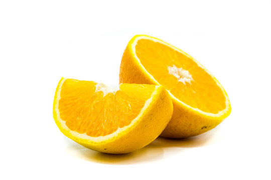 Fruit orange cut half quarter isolated on white background