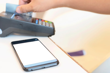 Hand Swiping Credit Card.