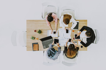 top view of business partners having conversation.the concept of teamwork.Young Business Team Brainstorming Meeting Process.Coworkers Startup Marketing Project.