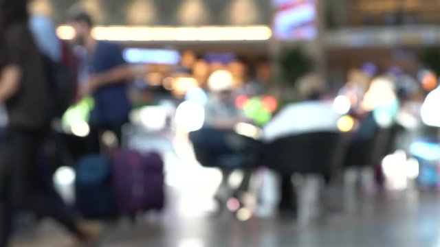Blurred View of Tourists and Passengers at Large International Airport Main Departure Hall. 4K