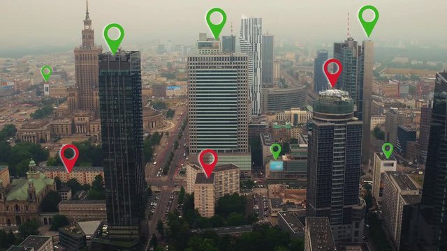 Aerial shot of Warsaw city center with localization icons.