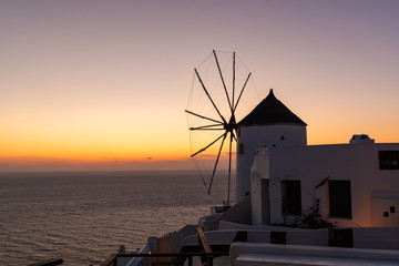 old windmill at sunset