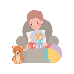 cute little boy baby with bear teddy in livingroom