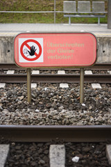 No crossing allowed sign in German railway