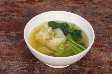 Asian traditional Wonton soup with herbs