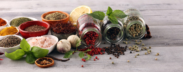 Spices and herbs on table. Food and cuisine ingredients with basil