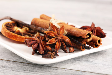 cinnamon, staranise and cloves. winter spices on wooden table