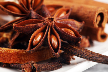 cinnamon, staranise and cloves. winter spices on wooden table