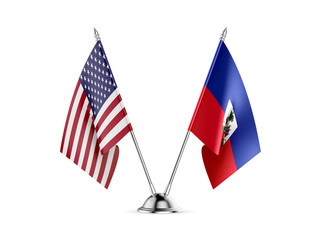 Desk flags, United States  America  and Haiti, isolated on white background. 3d image