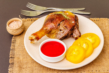 Crusty roasted duck leg. Traditional French food confit preparation