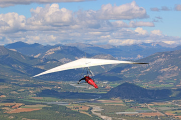 Fototapeta na wymiar Hang Glider flying from the Chabre mountain, France