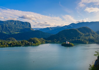 Beautiful landscape of the mountain Lake Bled during sunset from the wall of a medieval castle,...