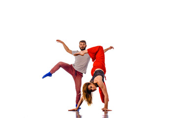 Fototapeta na wymiar Stunning couple dancing in studio, portrait