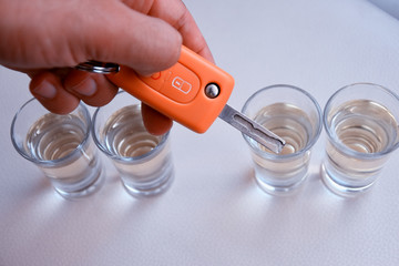 hand holding a glass of water