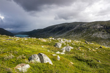 Fototapeta na wymiar clouds over the mountain road in Norway