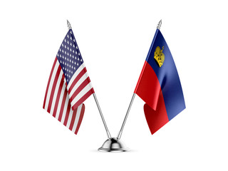 Desk flags, United States  America  and Liechtenstein, isolated on white background. 3d image