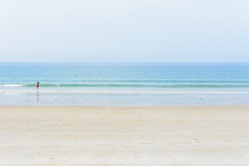Fototapeta na wymiar guernsey beach summer overexposed pastel colors