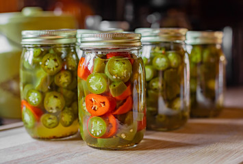 glass jars with pickled jalapenos