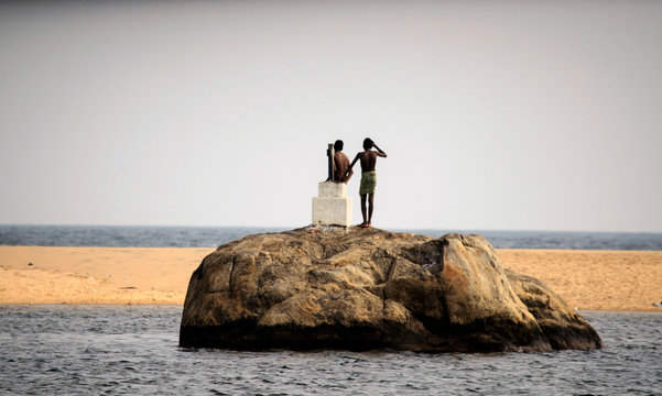 kids on top of elephant rock in poovar siland