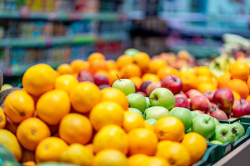 Shelf with fresh ripe fruit in supermarket. Shopping grocery